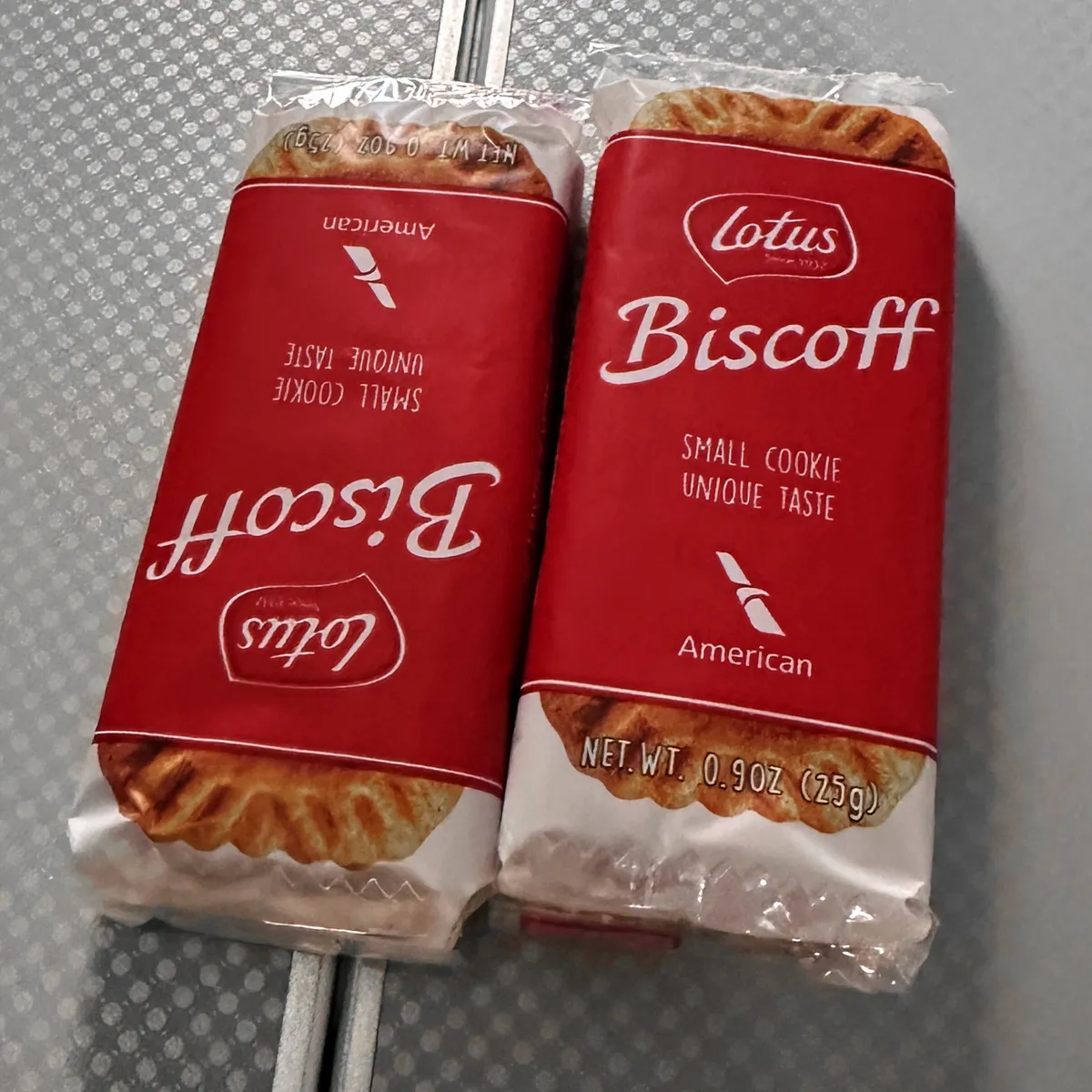 Two Lotus Biscoff packets with American Airlines logos