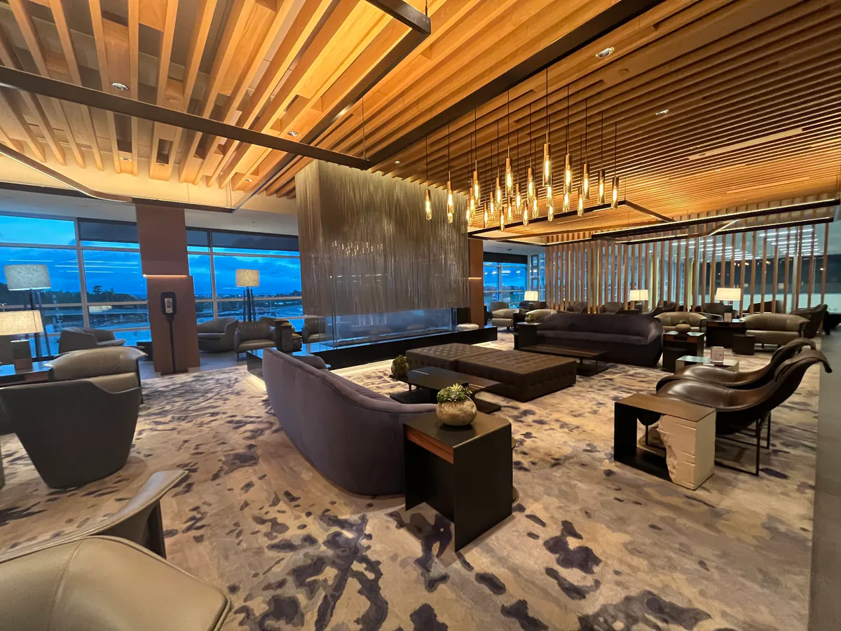 Luxury lounge access after booking entire trip with points from best travel credit cards 2026