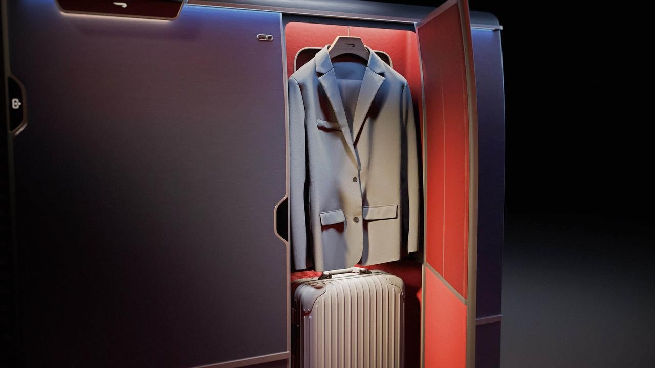 British Airways closet holding a blazer and a silver suitcase
